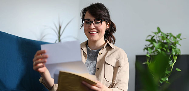 woman looking at healthcare letter